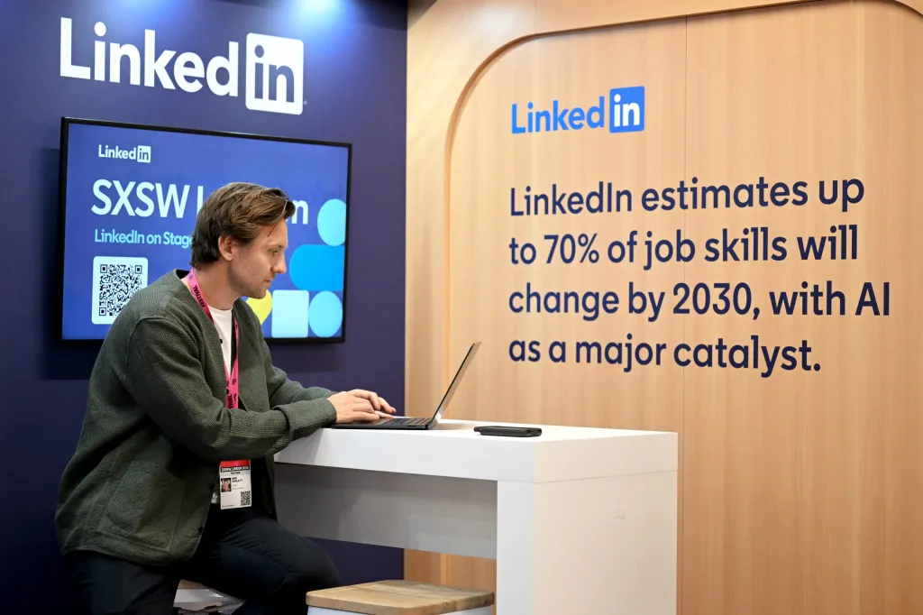 A LinkedIn booth display at SXSW London highlighting AI's impact on job skills